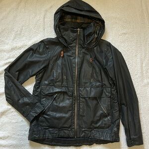 Omni Shield Rain jacket plaid detail small black